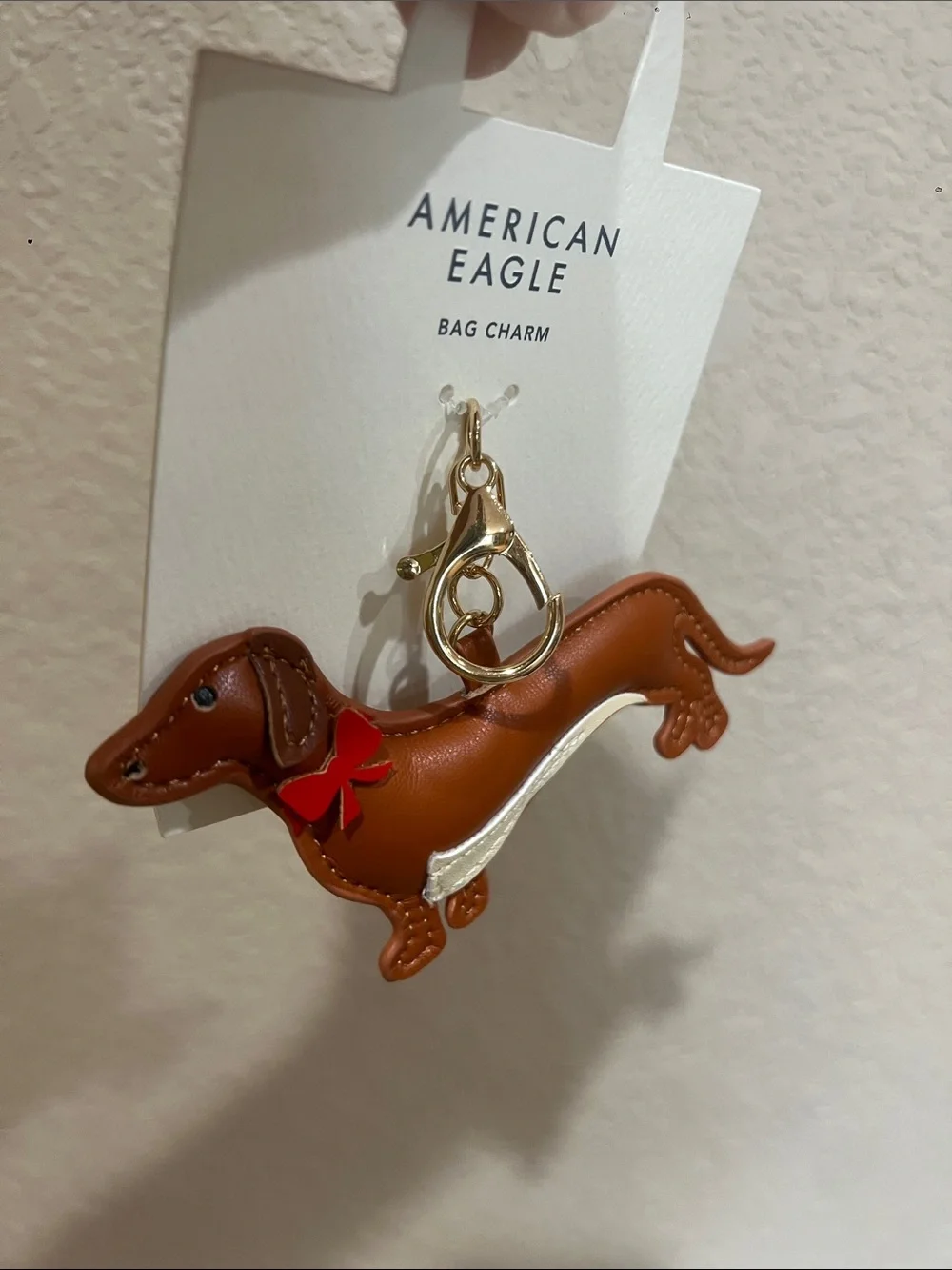 American Eagle Outfitters Brown & Cream Dachshund Bag Charm with Red Bow